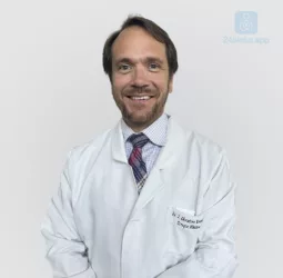 Dr. Christian Riveros